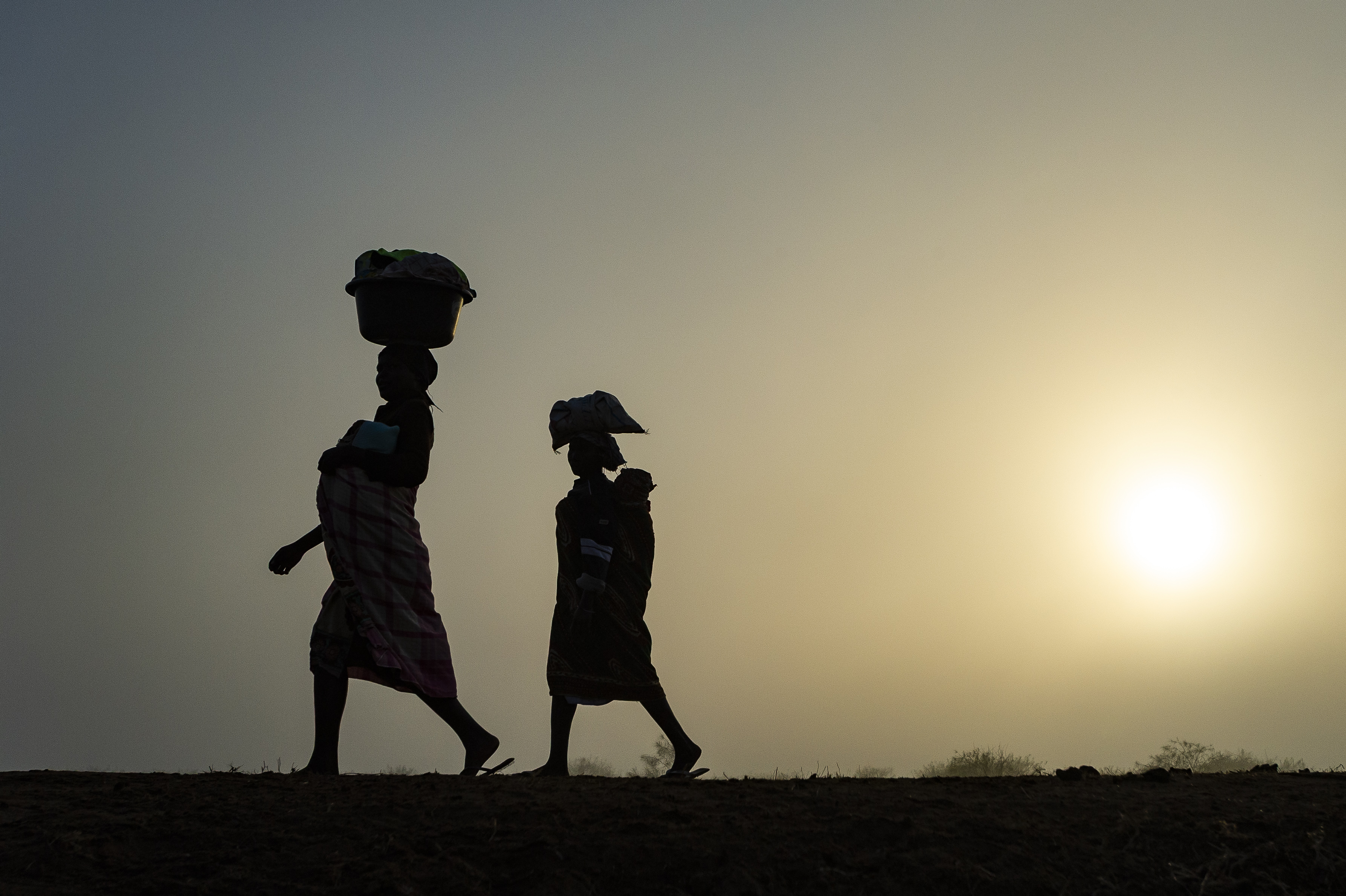 Two women at dawn